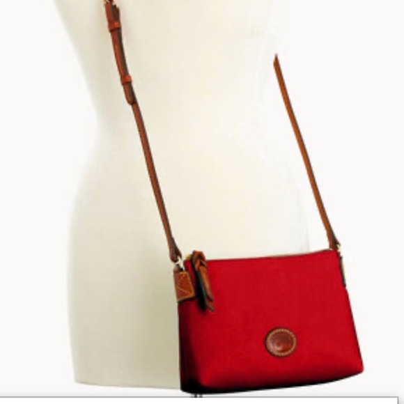 Dooney & Bourke Handbags - Dooney & Bourke nylon crossbody pouchette in color red. Perfect condition